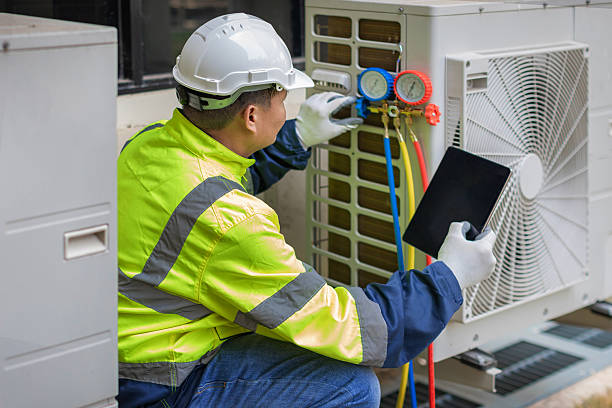 Professional Hvac technician working in Burkettsville, OH